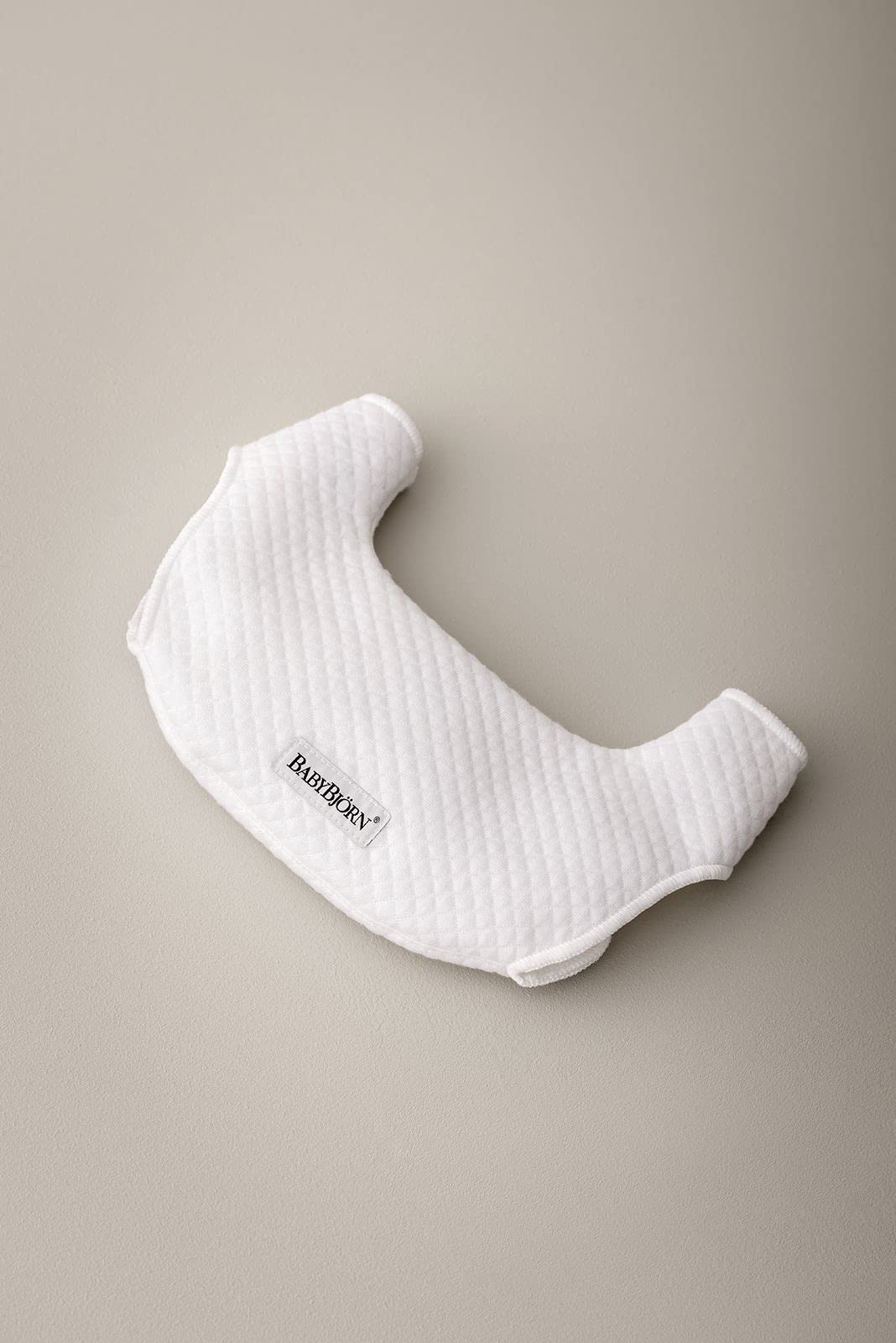 BabyBjörn Bib for Baby Carrier Harmony in white showing soft protective surface