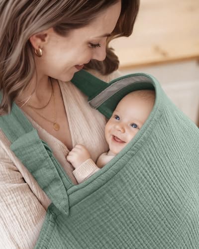 Mother wearing breathable muslin nursing cover showing adjustable strap features