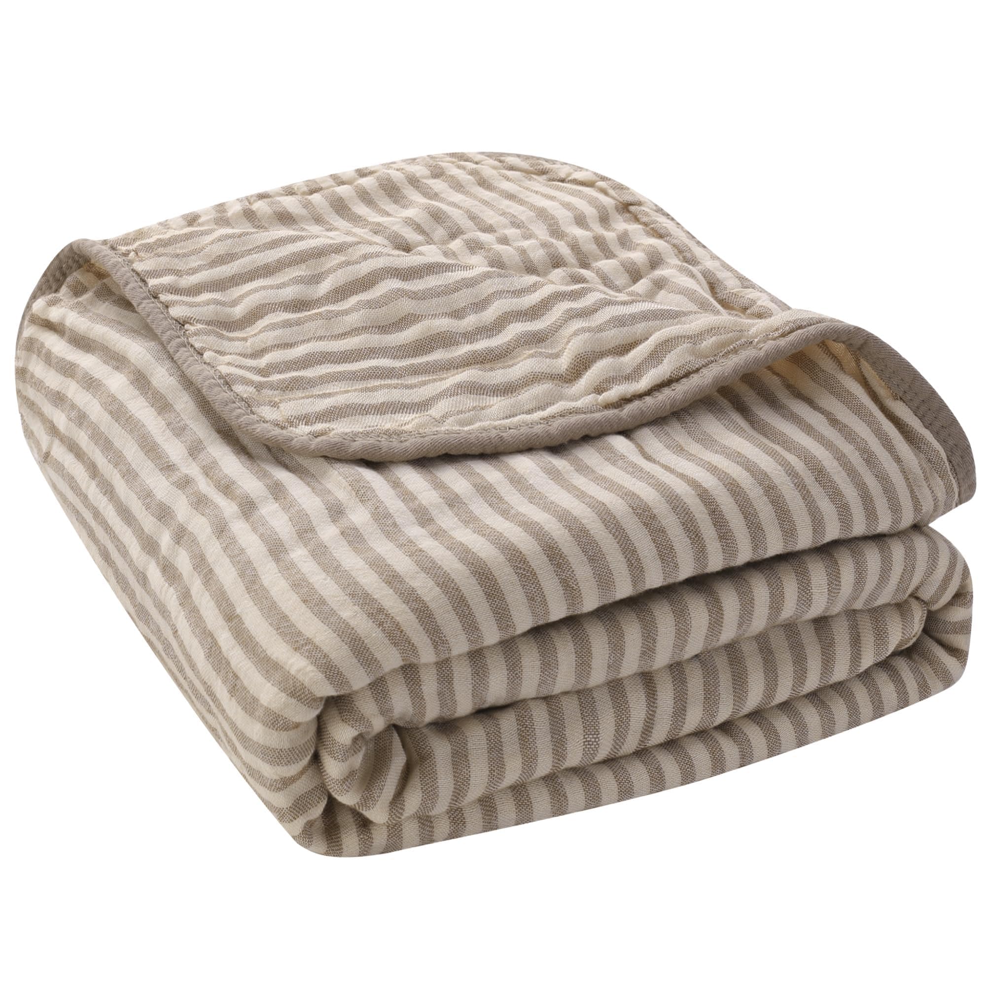 Organic muslin baby blanket in warm coffee striped jacquard on a nursery surface